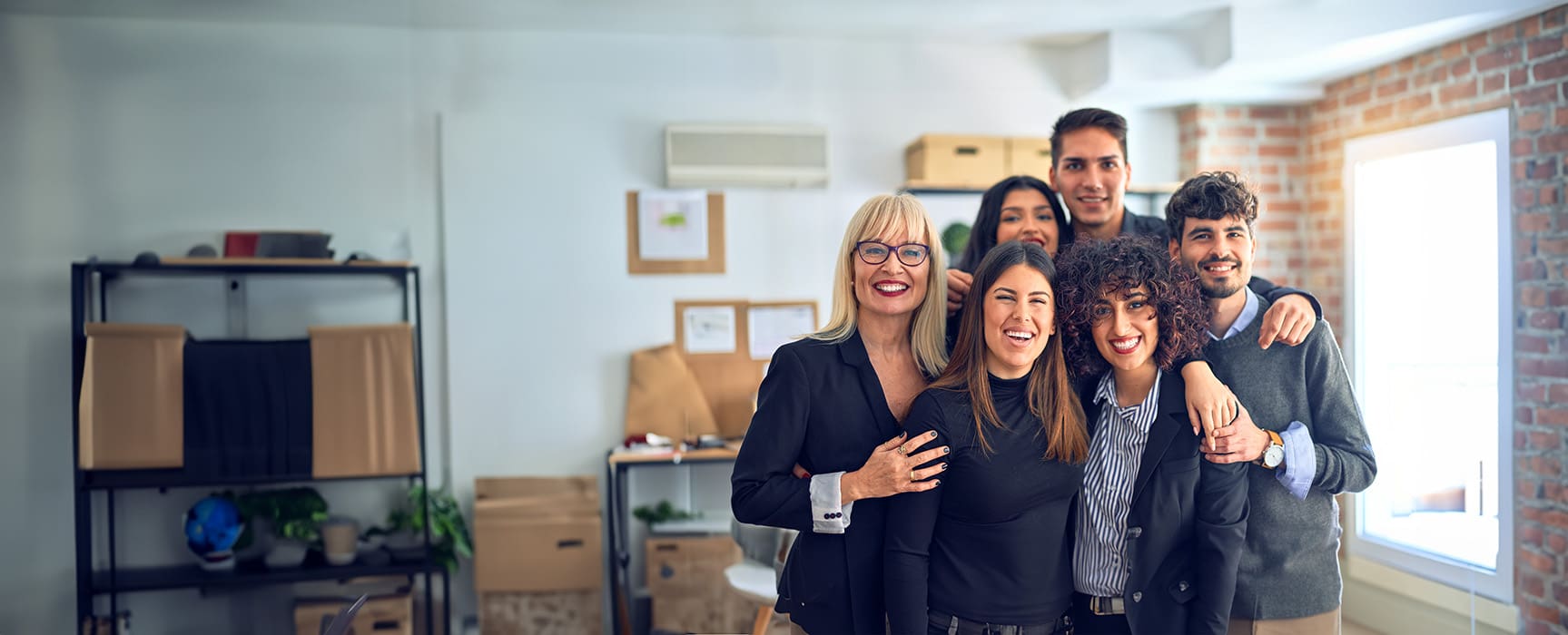 Group of happy smiling staff